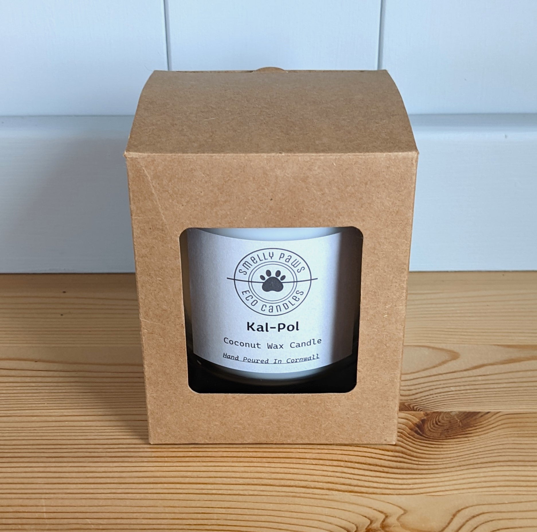 White Cal-Pol candle in cardboard presentation box